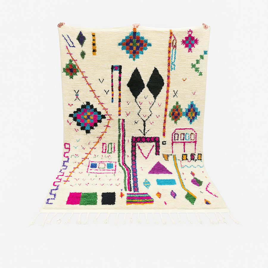 Handwoven colorful Moroccan wool rug with geometric Berber motifs on ivory background