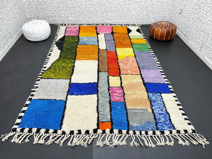 Handwoven colorful Moroccan wool rug with geometric patchwork design – multicolor Berber carpet handmade in Morocco