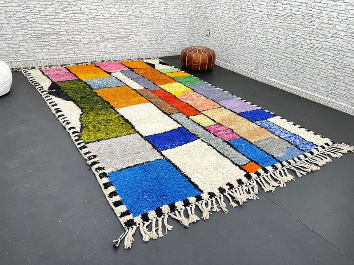 Handwoven colorful Moroccan wool rug with geometric patchwork design – multicolor Berber carpet handmade in Morocco