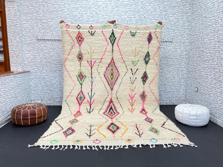 Colorful Moroccan wool rug with handwoven geometric and tribal patterns