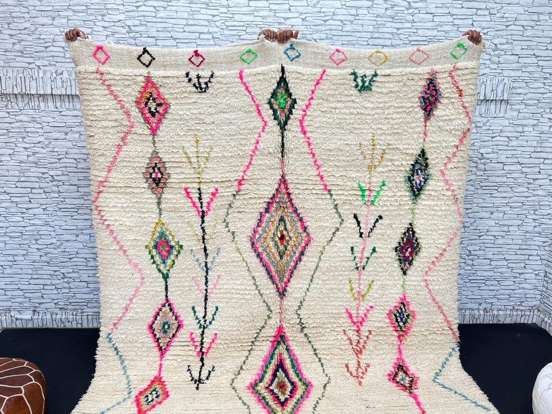 Colorful Moroccan wool rug with handwoven geometric and tribal patterns