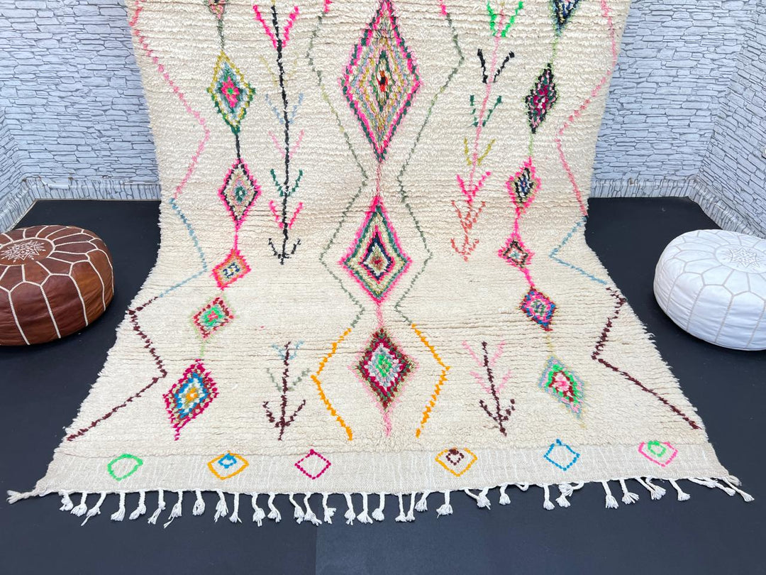 Colorful Moroccan wool rug with handwoven geometric and tribal patterns