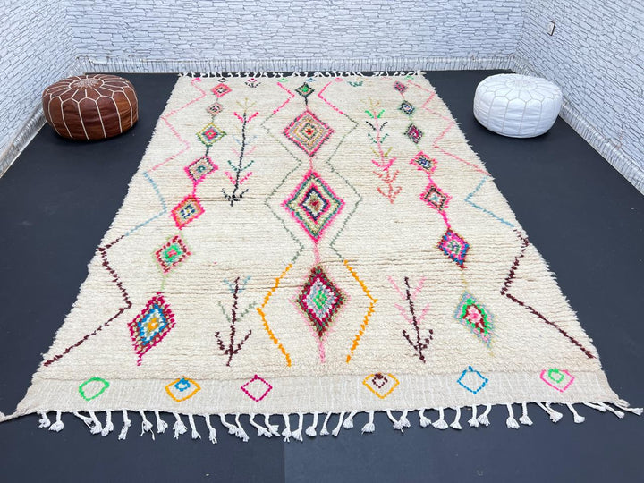 Colorful Moroccan wool rug with handwoven geometric and tribal patterns