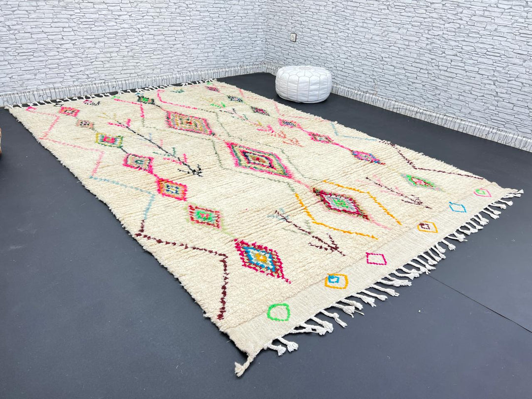 Colorful Moroccan wool rug with handwoven geometric and tribal patterns