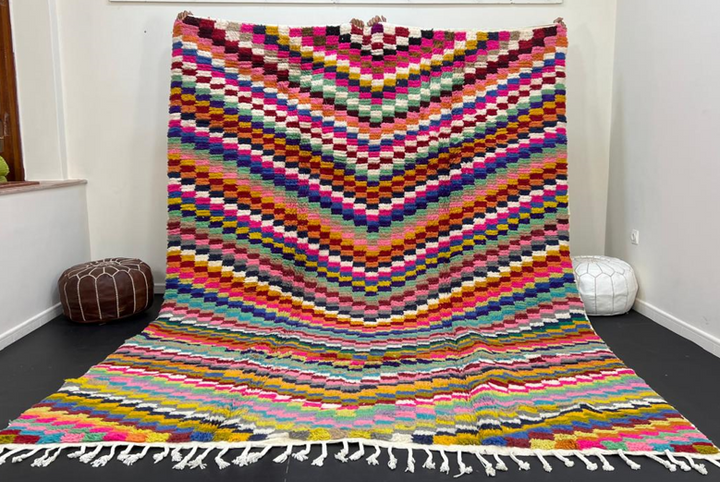Colorful Moroccan wool rug with layered geometric Berber pattern and multicolor stripes