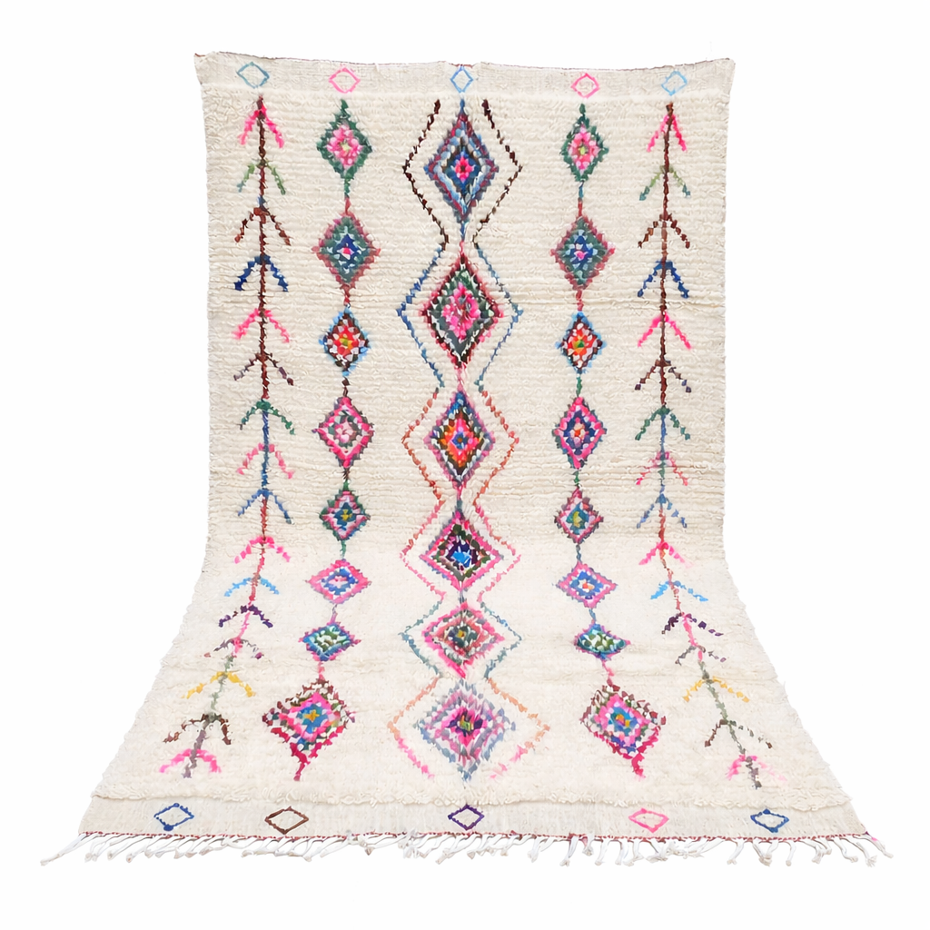 Colorful handmade Moroccan Berber rug with diamond tribal patterns on white wool