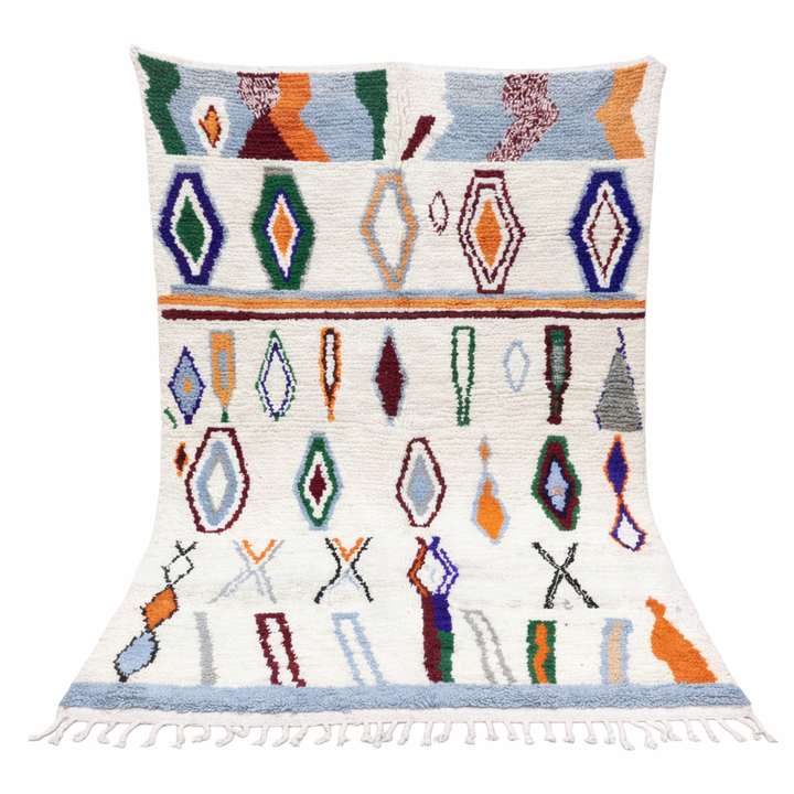 colorful handmade moroccan berber rug with geometric patterns on ivory wool background