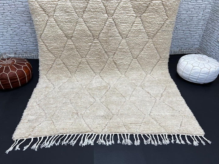 Cream Beni Mrirt Moroccan wool rug with raised diamond pattern, handmade by Berber artisans in the Atlas Mountains