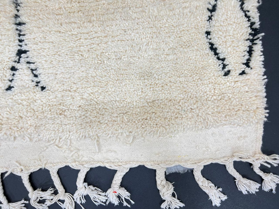 Cream Beni Ourain Moroccan wool rug with black diamond pattern