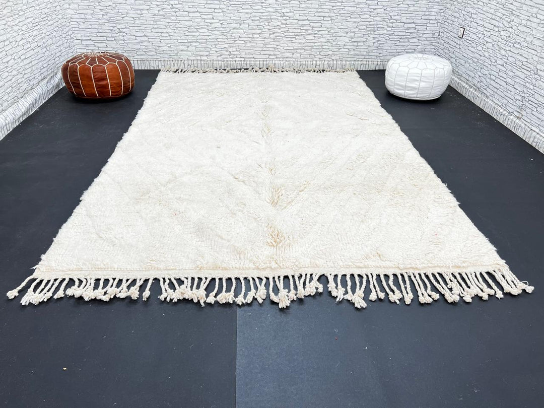 Handwoven cream Beni Ourain Moroccan wool rug with subtle chevron line pattern
