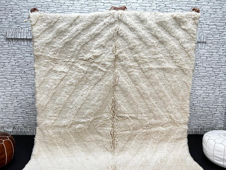 Handwoven cream Beni Ourain Moroccan wool rug with subtle chevron line pattern