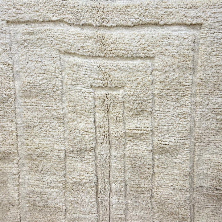 Handmade Beni Mrirt Moroccan wool rug with subtle geometric design. Ultra-soft, luxurious, and ethically crafted in Morocco.