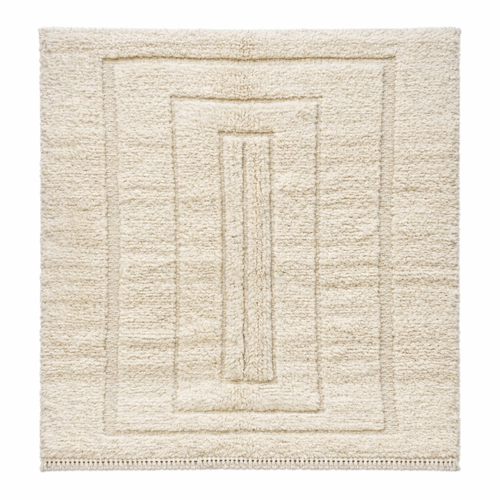 Handmade Beni Mrirt Moroccan wool rug with subtle geometric design. Ultra-soft, luxurious, and ethically crafted in Morocco.