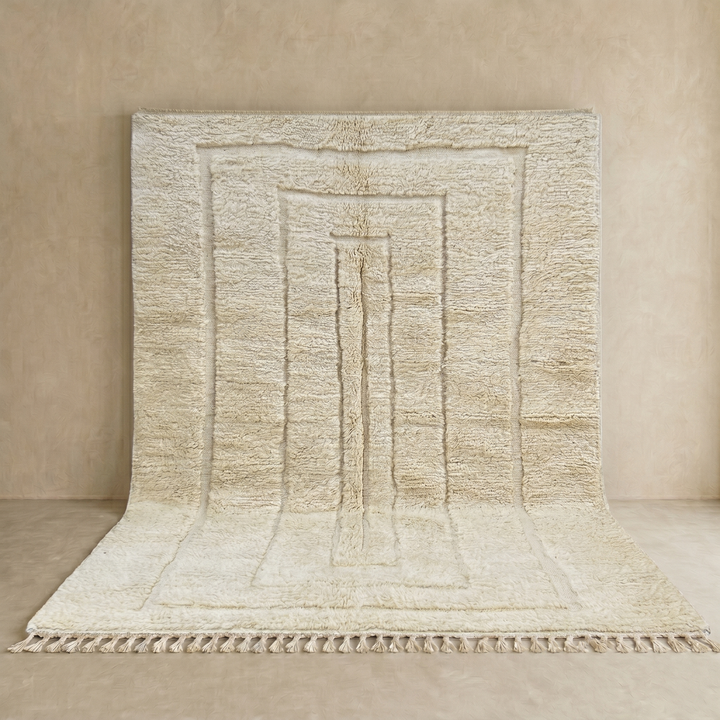 Handmade Beni Mrirt Moroccan wool rug with subtle geometric design. Ultra-soft, luxurious, and ethically crafted in Morocco.