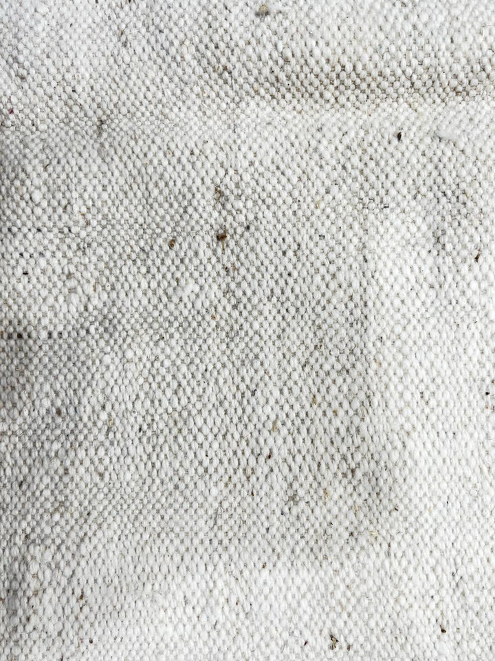 Handwoven Moroccan flatweave rug in cream, light purple, and black – geometric wool Berber carpet handmade in Morocco