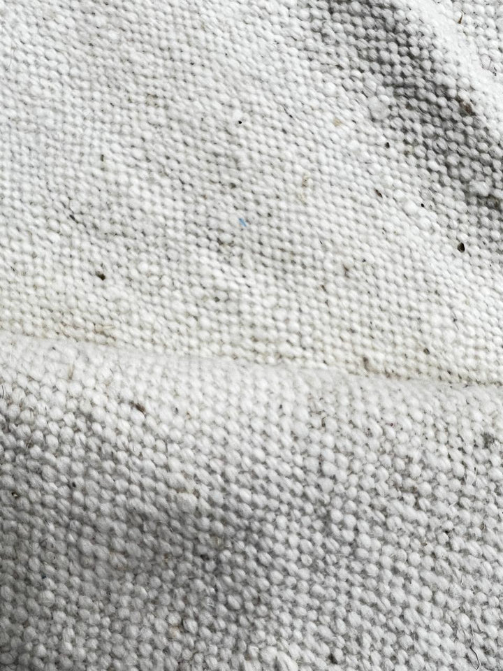 Handwoven Moroccan flatweave rug in cream, light purple, and black – geometric wool Berber carpet handmade in Morocco