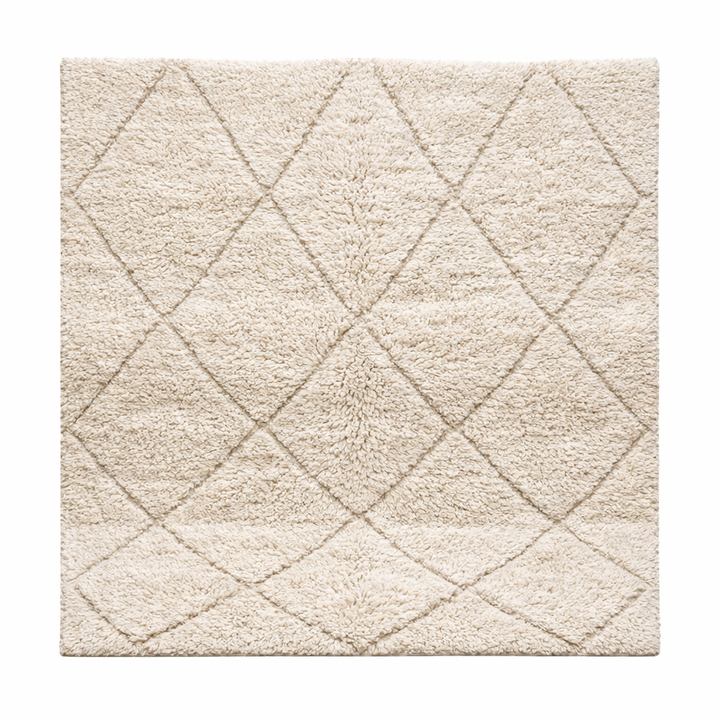 Cream Moroccan wool rug with diamond Berber pattern and plush texture