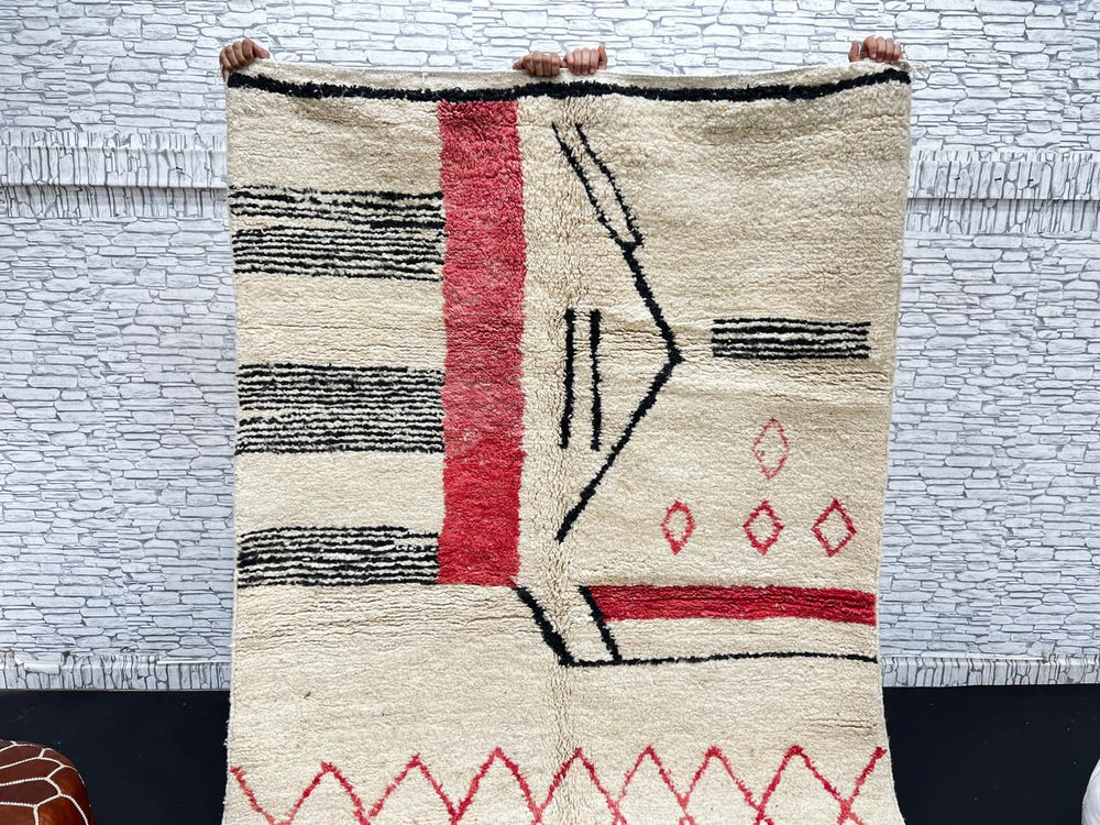 Handmade cream Moroccan wool rug with red and black geometric lines – modern Berber design