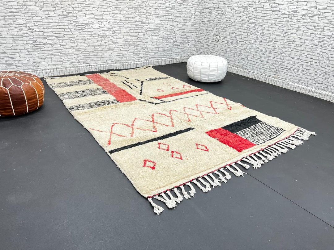 Handmade cream Moroccan wool rug with red and black geometric lines – modern Berber design