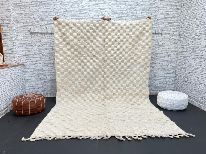 Cream textured Moroccan wool rug with raised dot design