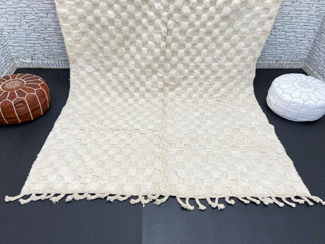 Cream textured Moroccan wool rug with raised dot design