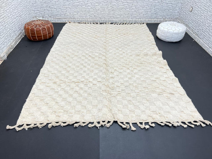 Cream textured Moroccan wool rug with raised dot design