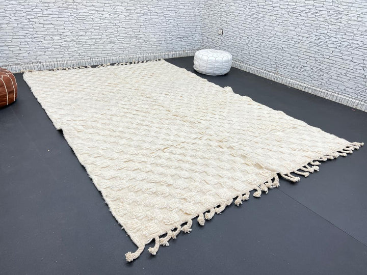 Cream textured Moroccan wool rug with raised dot design