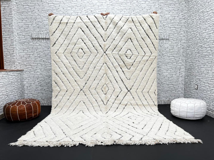 Handmade cream white Moroccan wool rug with black diamond lines and plush wool texture