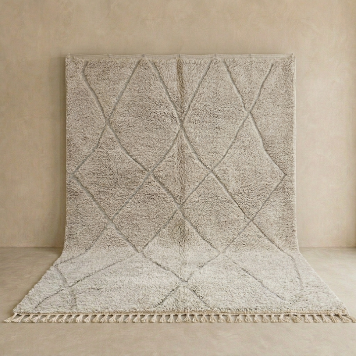 Cream Moroccan wool rug with diamond Berber pattern and plush texture