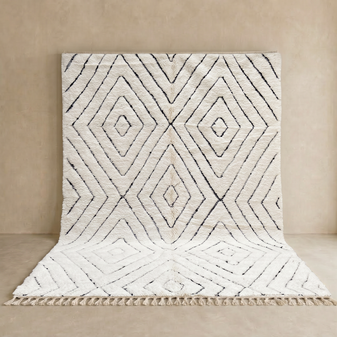 Handmade cream white Moroccan wool rug with black diamond lines and plush wool texture