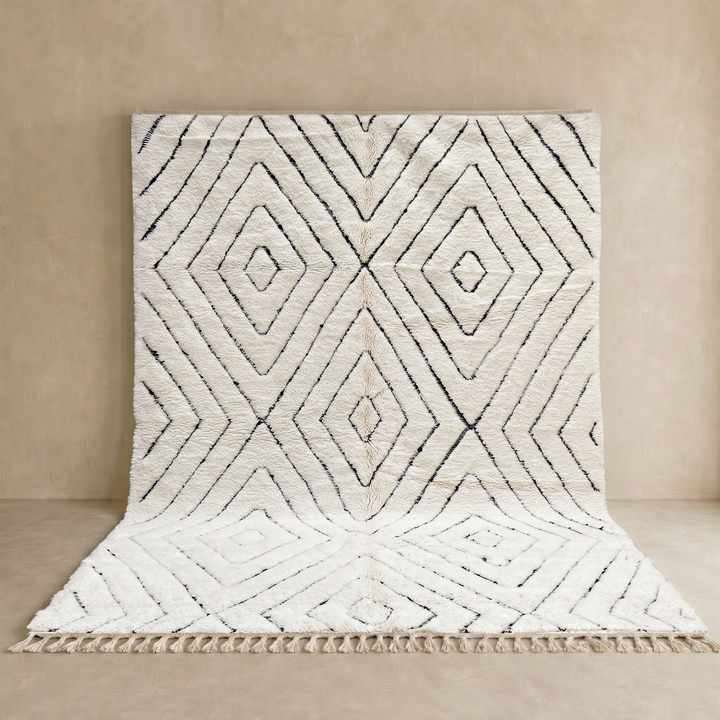 Handmade cream white Moroccan wool rug with black diamond lines and plush wool texture