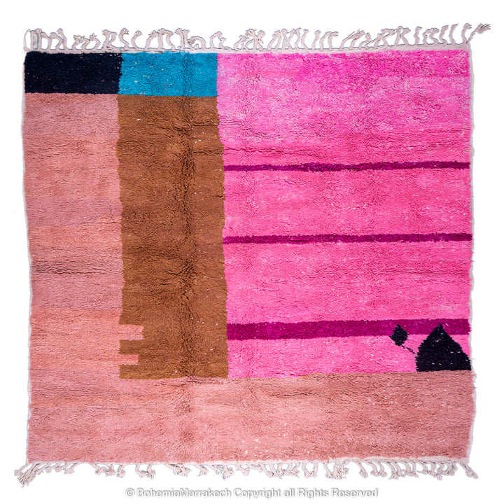 Handmade Moroccan rug in pink, brown, and blue wool with geometric design, perfect for modern interiors and Moroccan style decor.