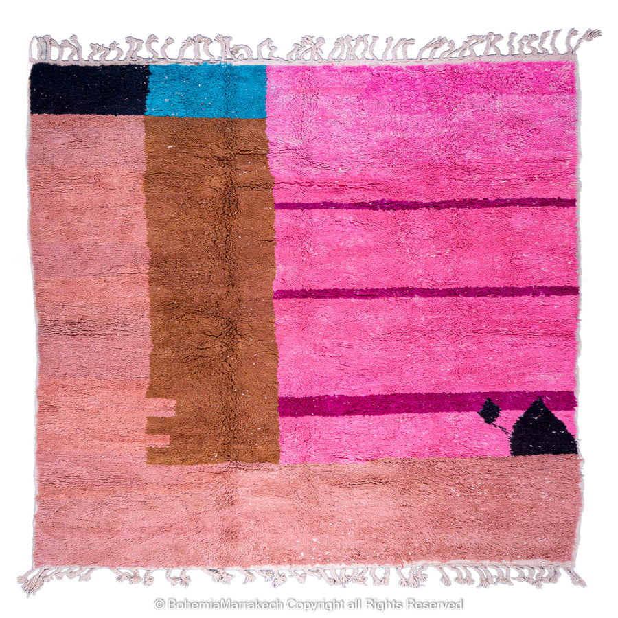Handmade Moroccan rug in pink, brown, and blue wool with geometric design, perfect for modern interiors and Moroccan style decor.