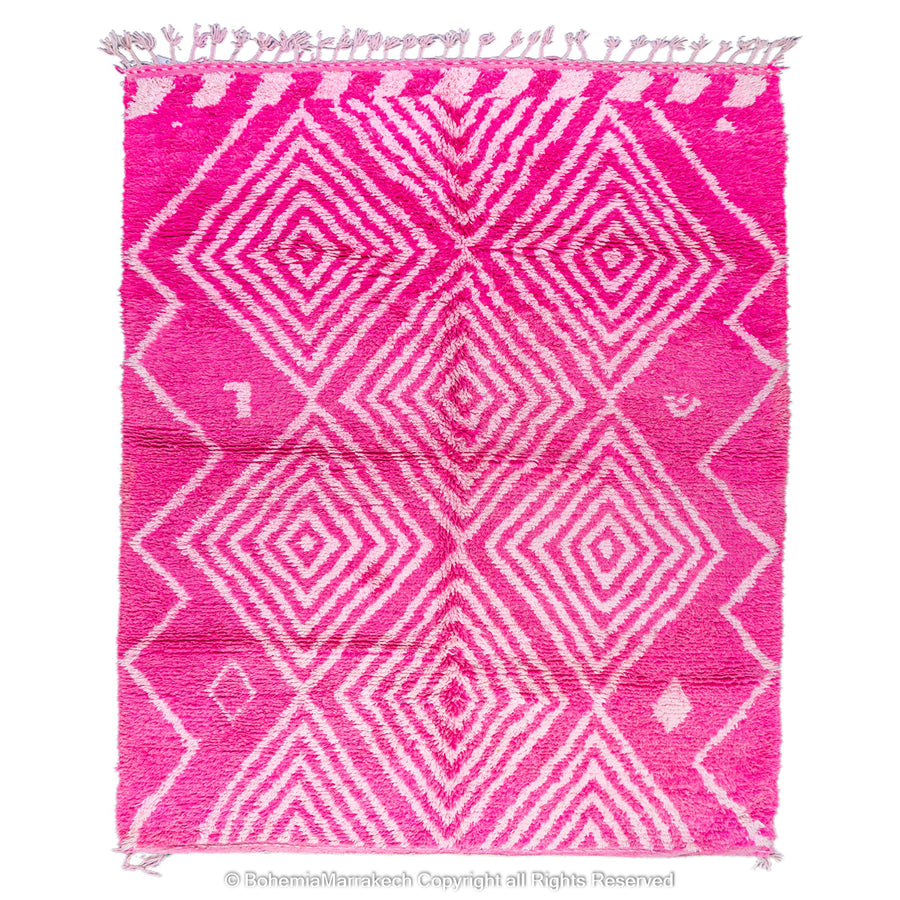 Pink Moroccan Berber diamond motif wool rug with geometric patterns, handmade by artisans, 8x10 size. Vibrant and cozy.