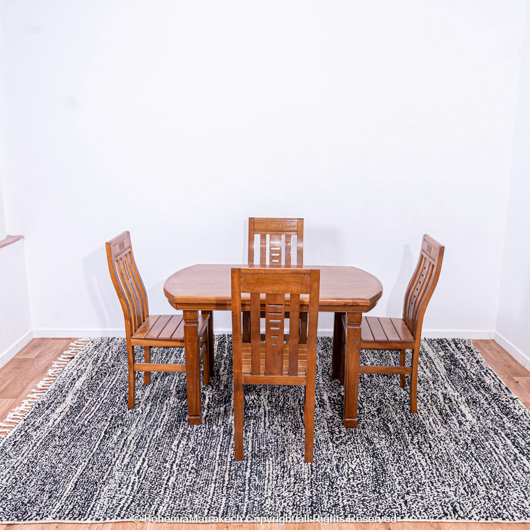 Dining set on Grey Moroccan Beni Ourain Wool Rug, showcasing elegant Berber design and earthy texture, ideal for modern interiors.