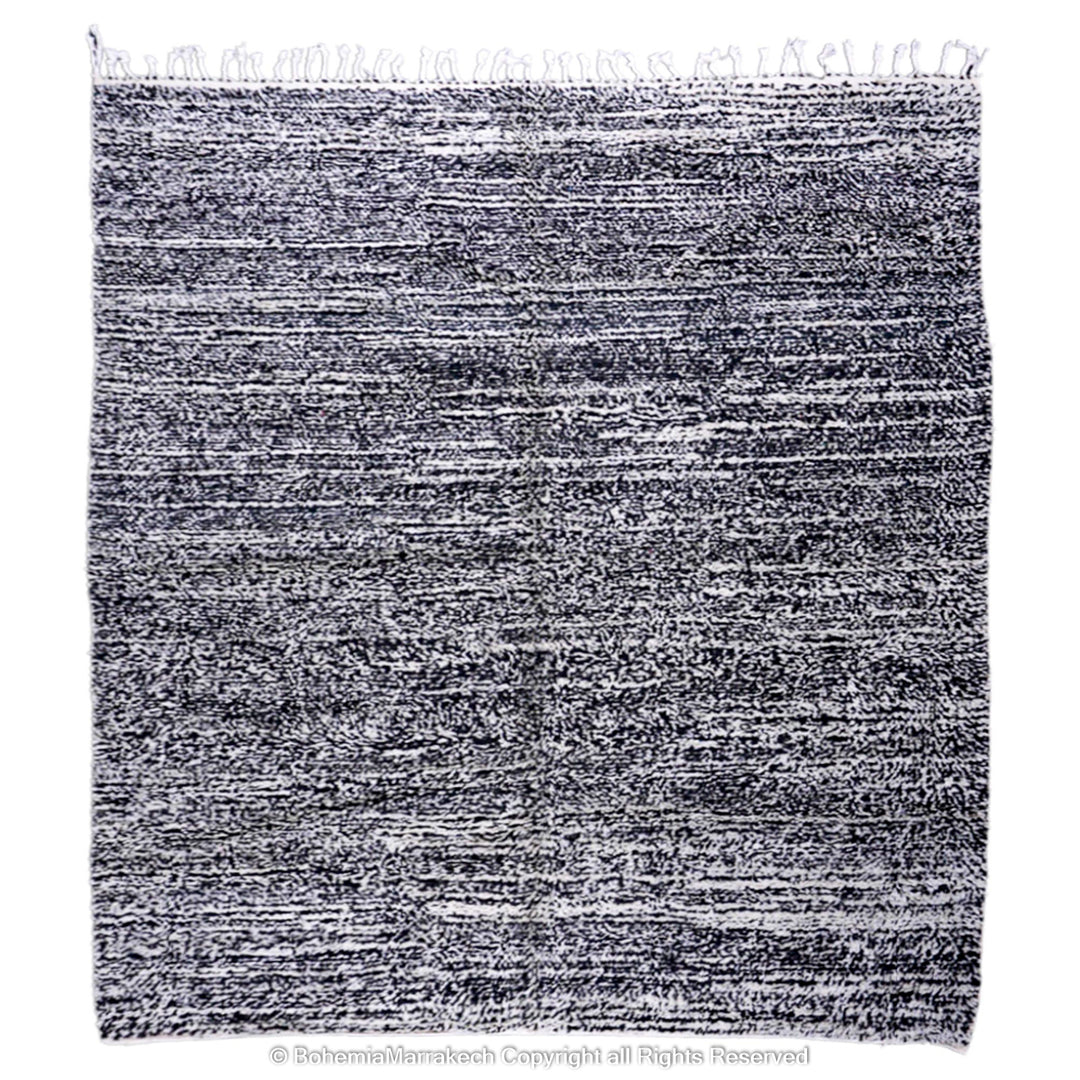 Grey Moroccan Beni Ourain wool rug with a marbled dark grey and white pattern, perfect for modern interiors.