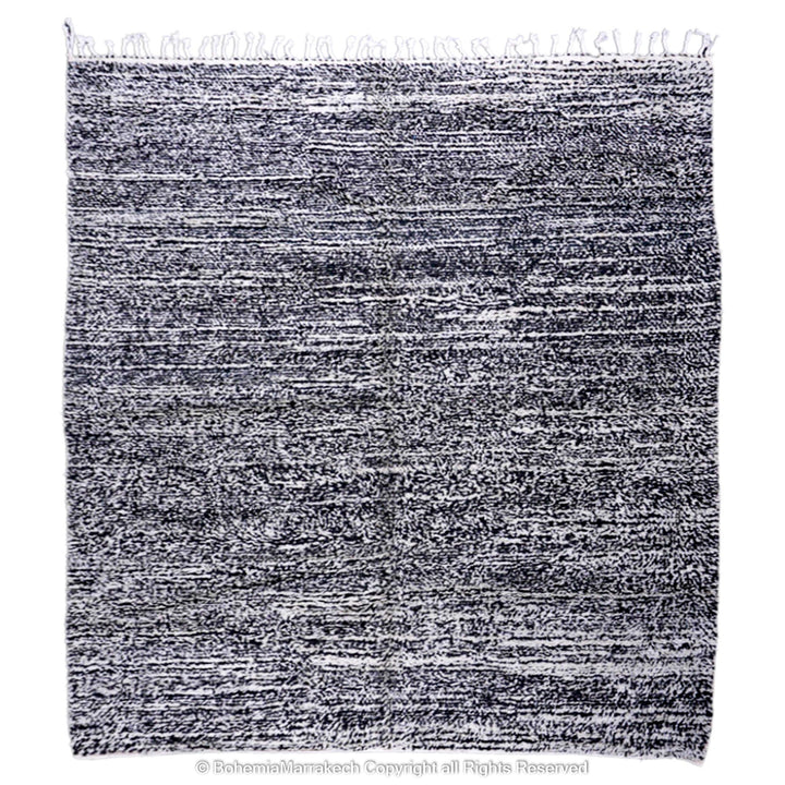 Grey Moroccan Beni Ourain wool rug with a marbled dark grey and white pattern, perfect for modern interiors.