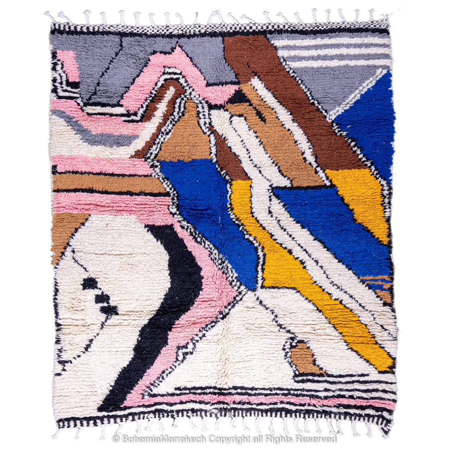 Colorful handmade Moroccan wool rug with abstract design in blue, mustard, pink, and brown. Traditional Berber style.