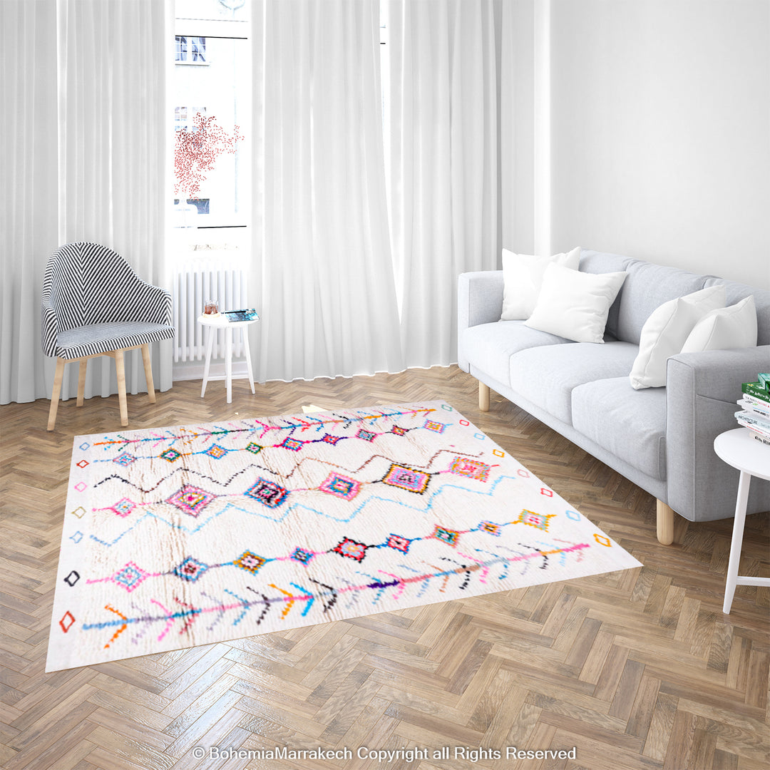 Colorful Moroccan rug with diamond Berber pattern in a bright modern living room.