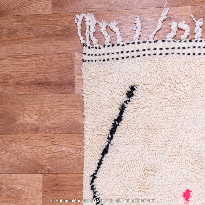Ivory Azilal Moroccan Rug with Black Diamond Motifs and Vibrant Designs, Handwoven Wool Carpet by Berber Artisans