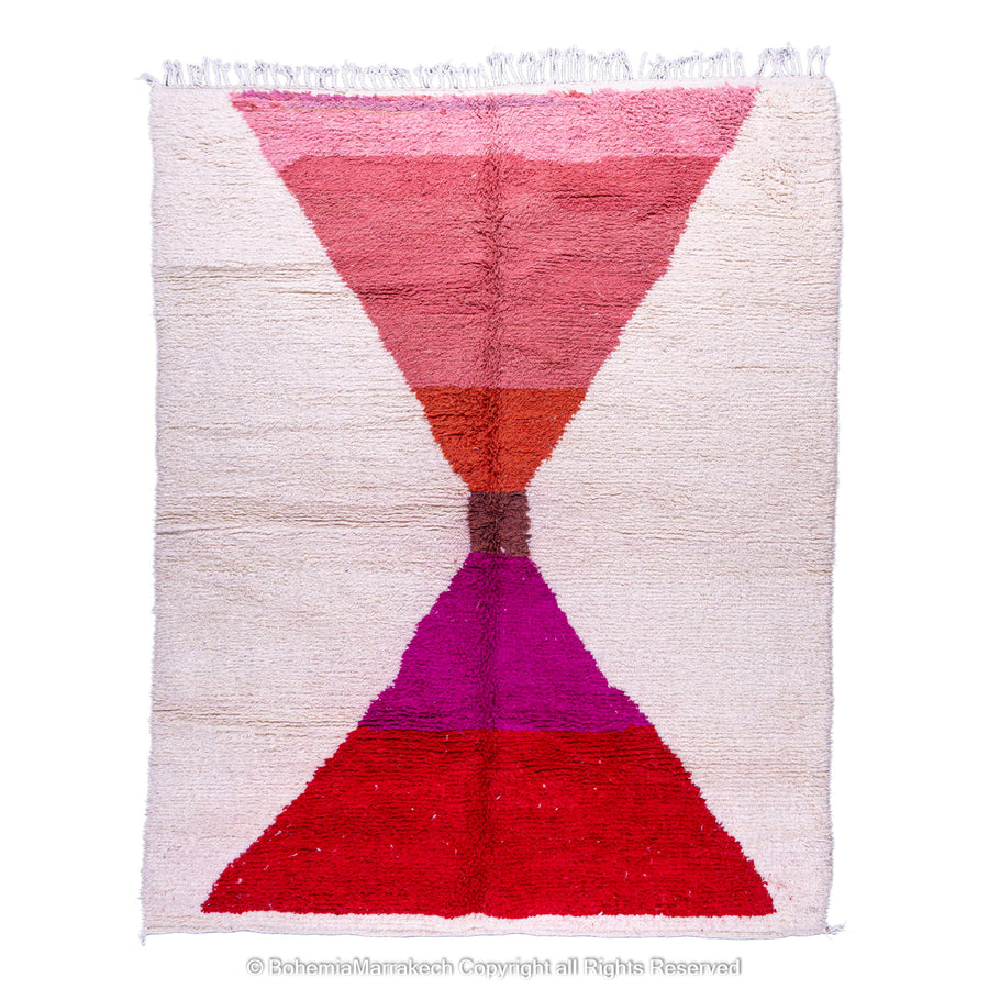 Handmade Moroccan Berber rug with red and pink hourglass design on natural wool base, 8x10 area rug, traditional Moroccan carpet.