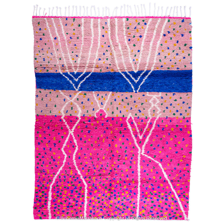 Pink and blue Moroccan rug with multicolor specks and geometric white lines