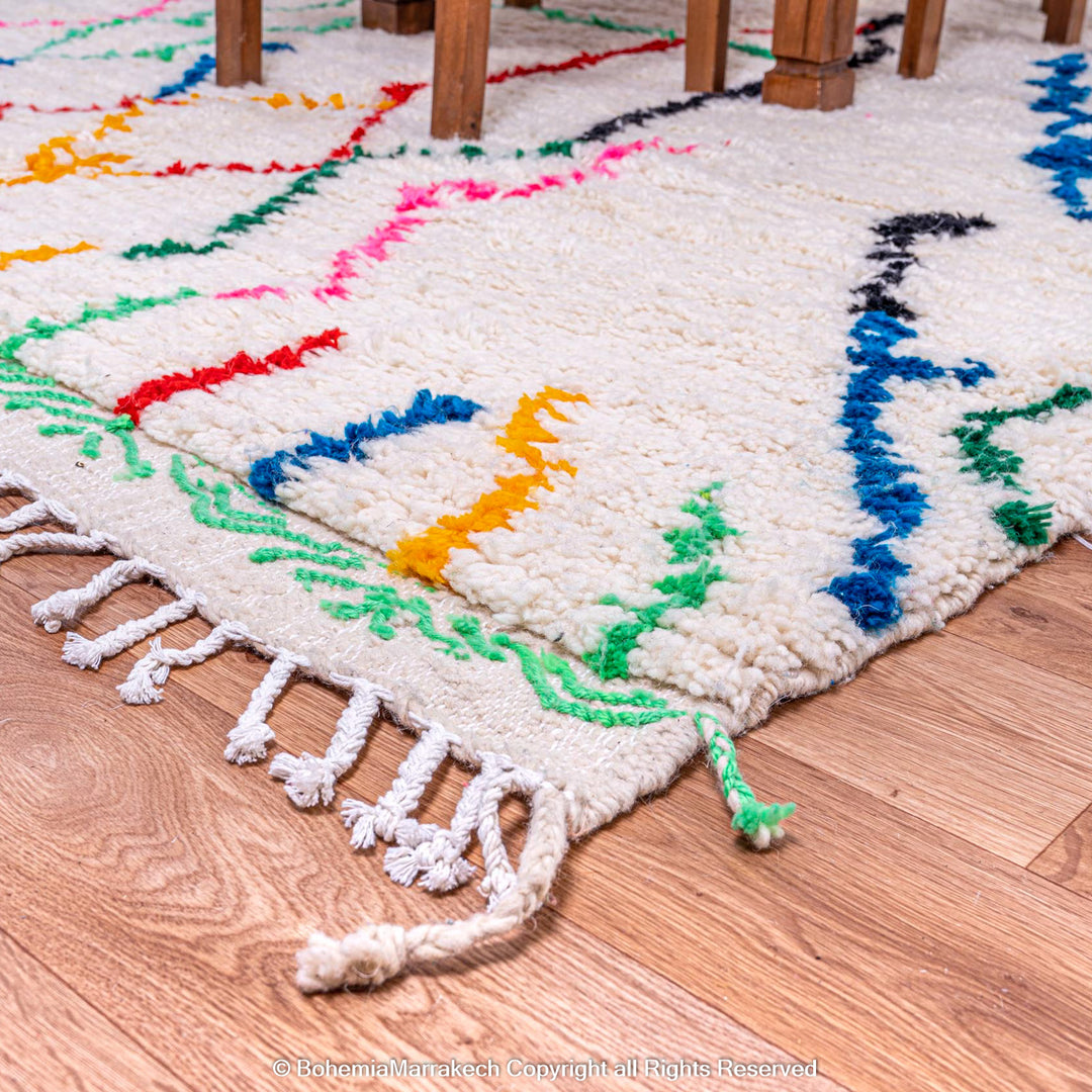 Colorful abstract Beni Ourain Moroccan rug with multicolor lines on white wool