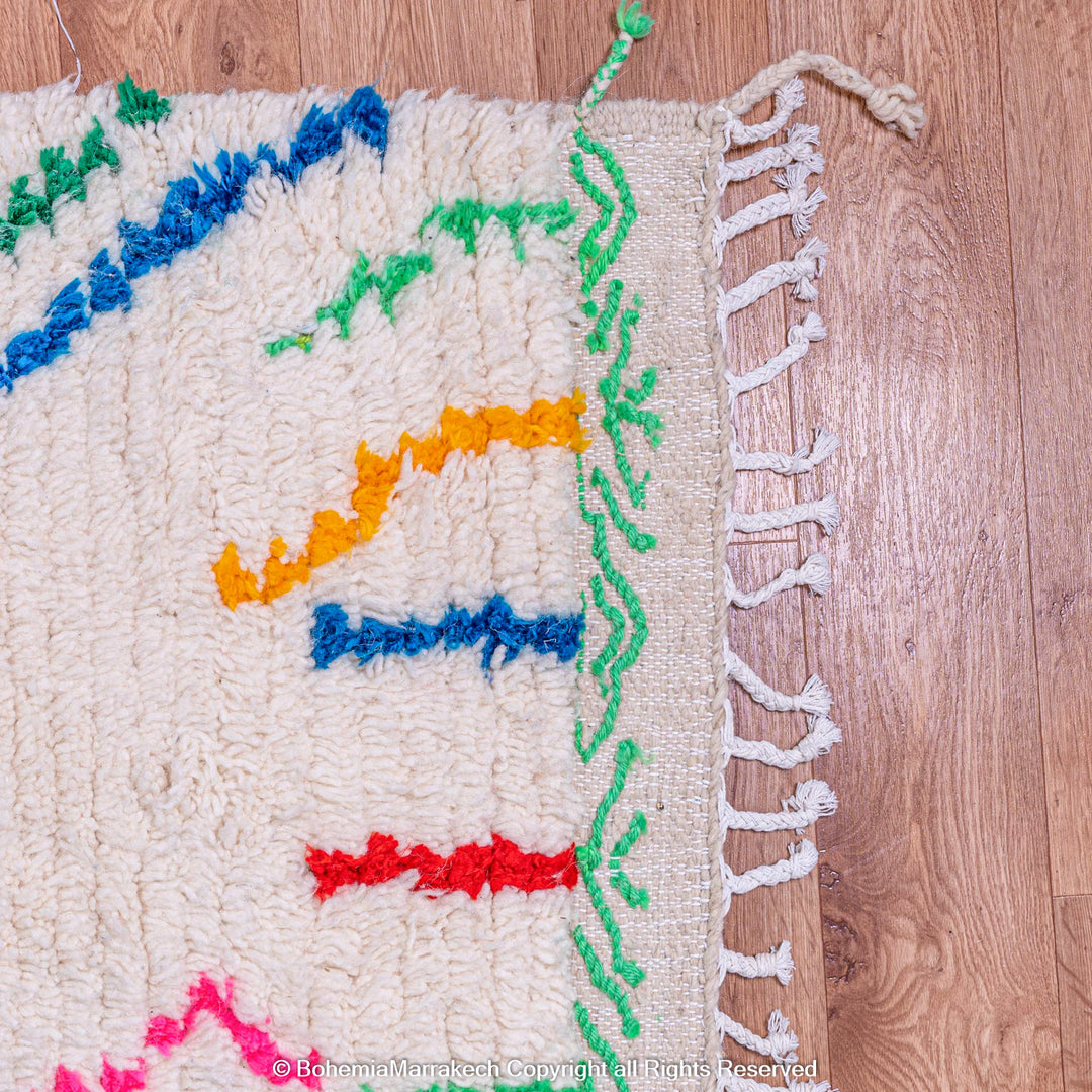 Colorful abstract Beni Ourain Moroccan rug with multicolor lines on white wool
