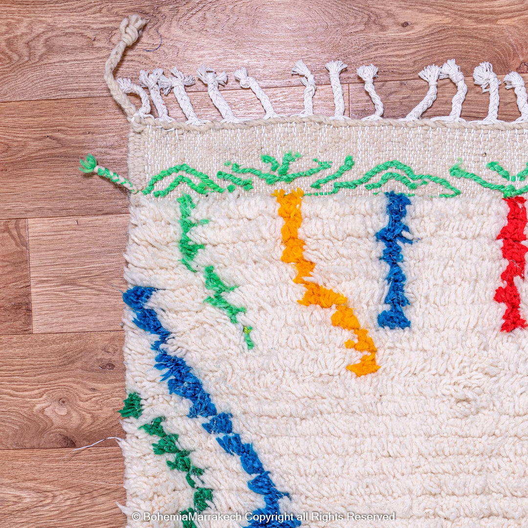 Colorful abstract Beni Ourain Moroccan rug with multicolor lines on white wool