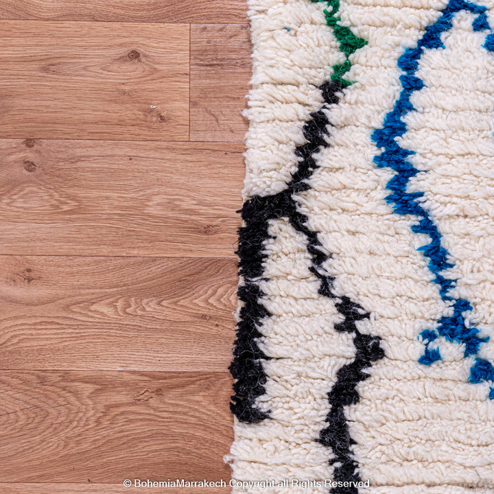 Colorful abstract Beni Ourain Moroccan rug with multicolor lines on white wool