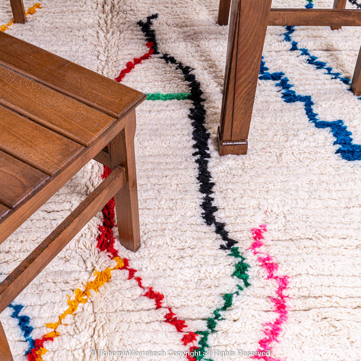 Colorful abstract Beni Ourain Moroccan rug with multicolor lines on white wool