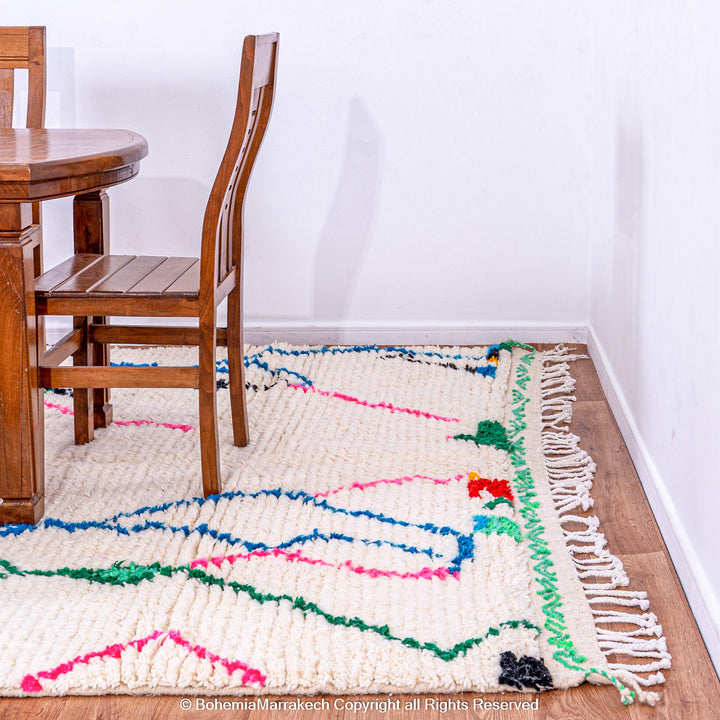 Colorful abstract Beni Ourain Moroccan rug with multicolor lines on white wool