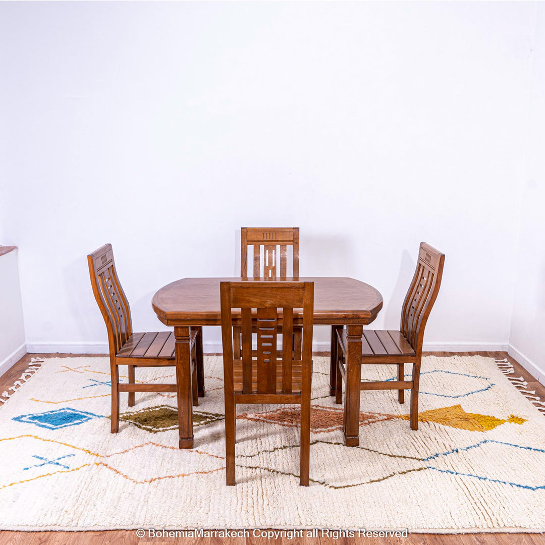 Minimal handmade Moroccan rug with diamond Berber motifs on white wool