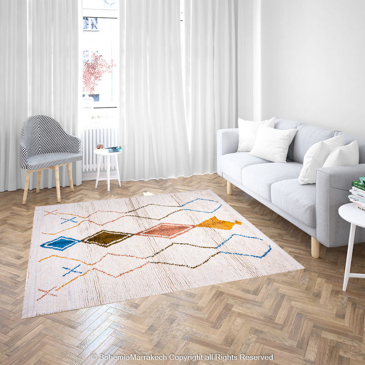 Minimal handmade Moroccan rug with diamond Berber motifs on white wool